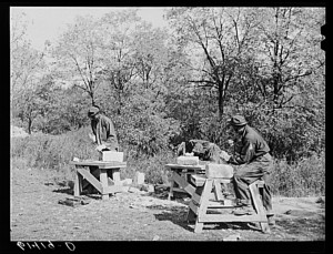 CCC (Civilian Conservation Corps) boys chopping stones for use in building charcoal burners at picnic grounds of recreation area. Ross County, Ohio.2