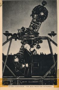 Clyde Fisher with the Zeiss planetarium projection instrument